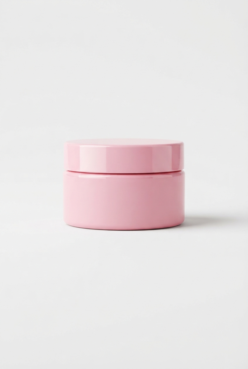 Pink lip mask jar centered on matte off-white background