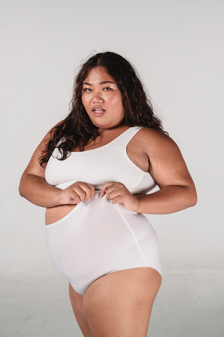 A model showcasing white shapewear.