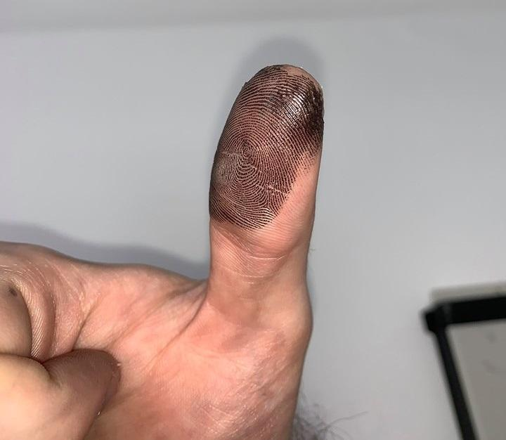 Once rolled, check the ink on your finger to see how well it applied: