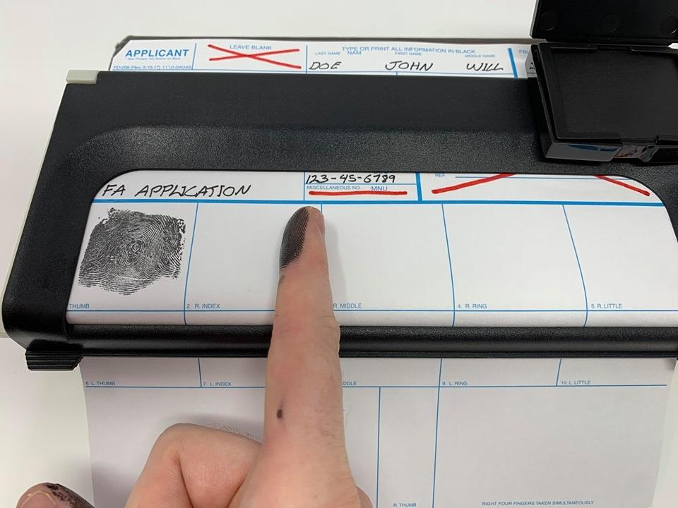 Thoroughly clean each finger and remove all ink with water