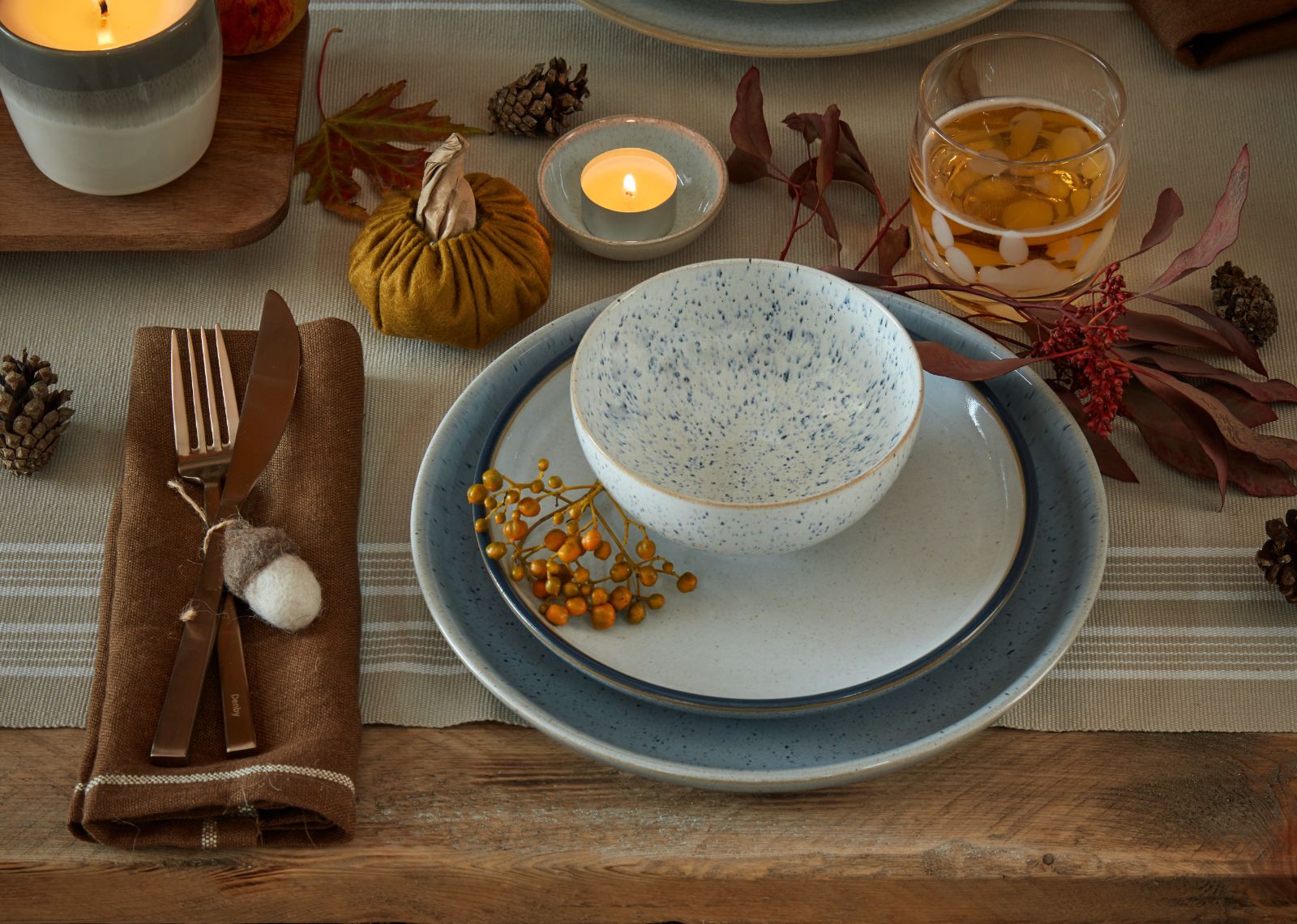 Thanksgiving place setting with tableware and glas