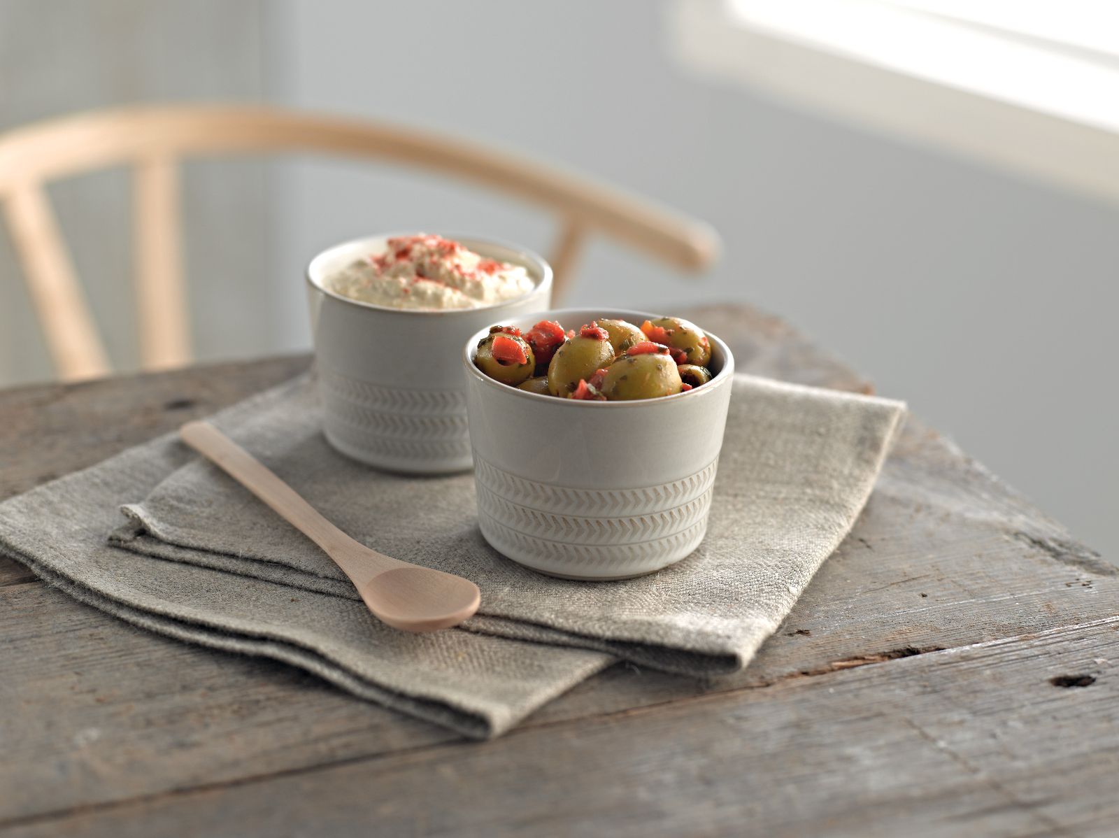 Olives and houmous in Natural Canvas ramekins
