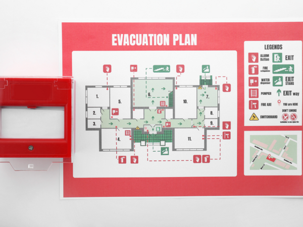 fire alarm next to evacuation plan