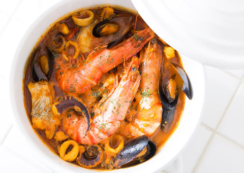 Bouillabaisse with mussels and clam and fish