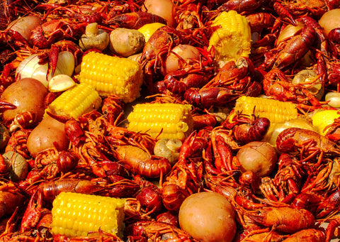 Crawfish boil with corn, potatoes and lemons