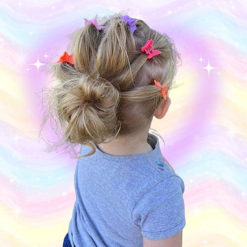 Messy bun with butterfly clips