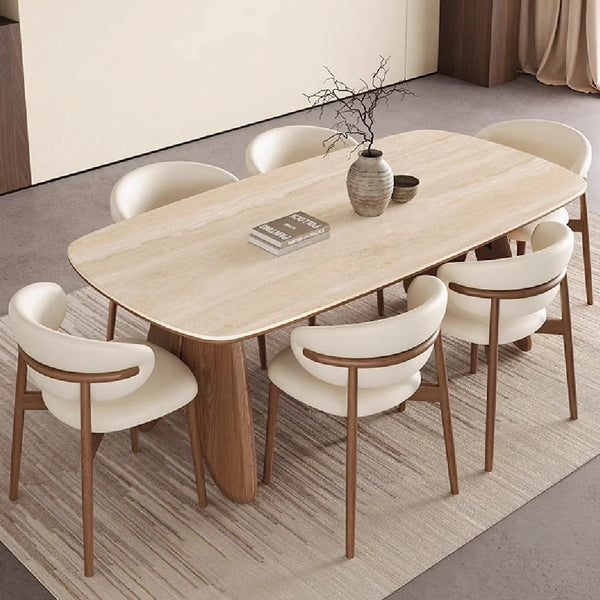 Ceramic stone dining table with six chairs featuring backrests.