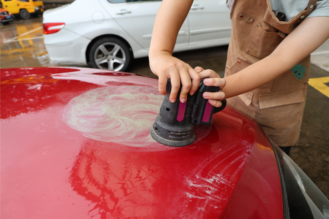 The sanding discs is sanding the car
