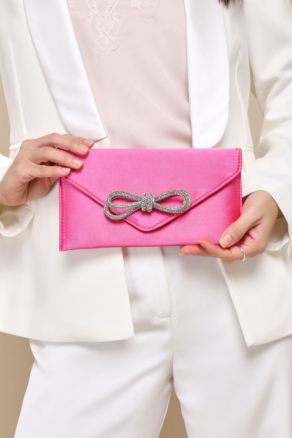 fuchsia satin rhinestone bow clutch