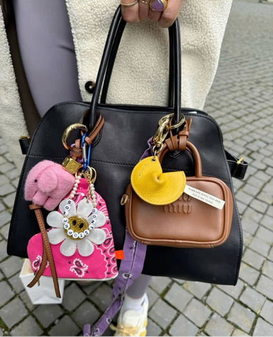 Hermes and miumiu bag with mix match bag charm with emijay big sale hair claw clips durable, lightweight, and perfect for thick hair . Ideal for effortless everyday hairstyles.