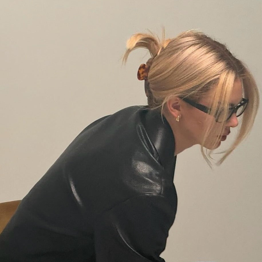 Mini French twist updo on fine hair with pastel claw clip