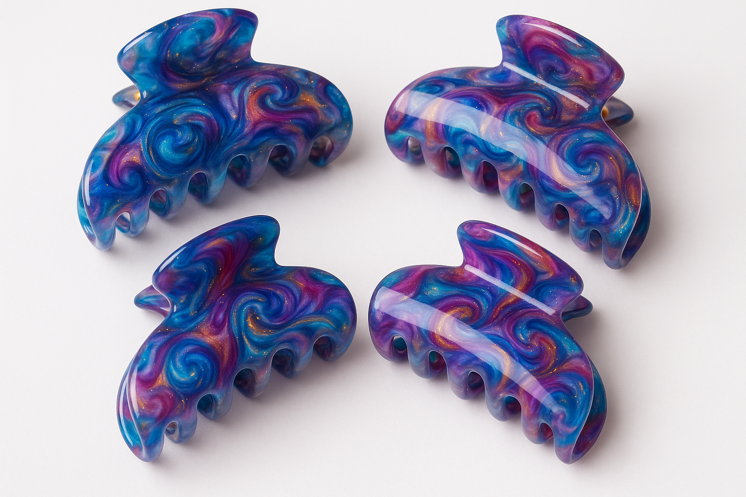 Hand-poured resin claw clips in colorful swirl designs