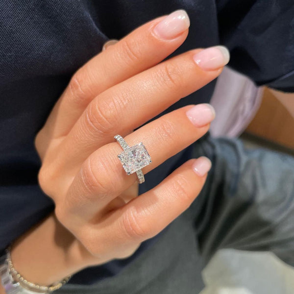 Mesmerizing Radiant Moissanite Ring With Side Stone